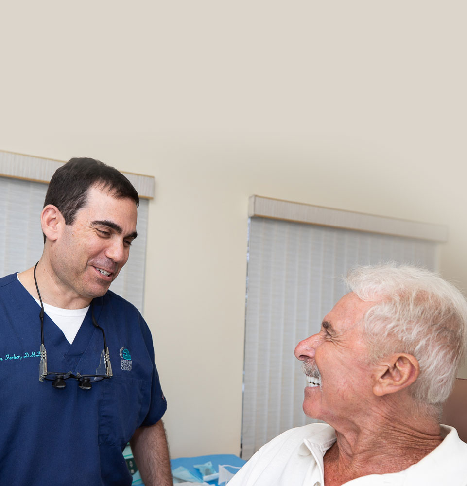 dental patient smiling with dentist